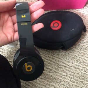 Beats solo headphones black and yellow.